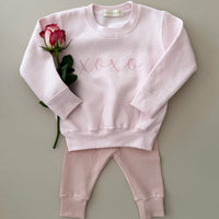 XOXO BABY PINK SWEATSHIRT